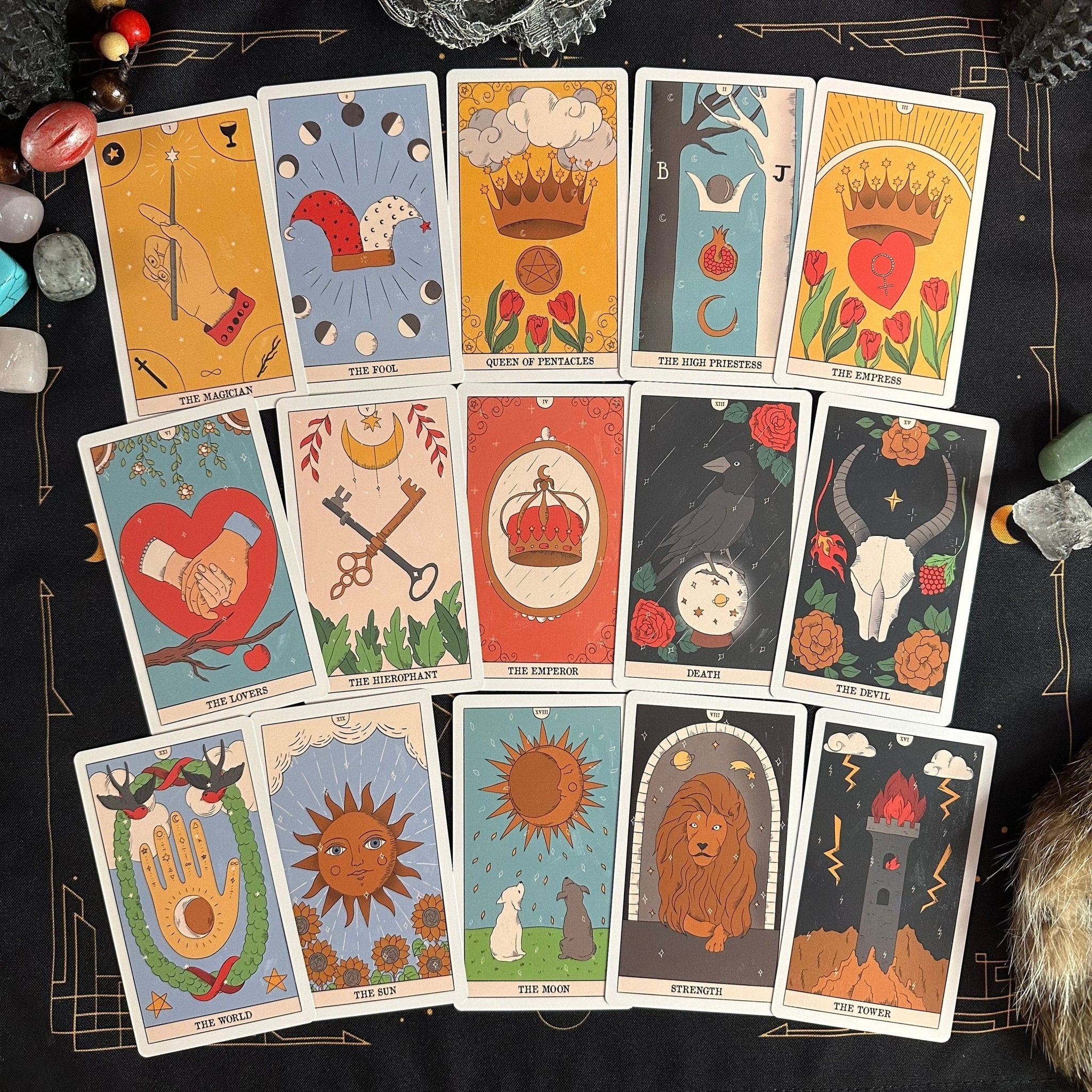 Moon Magic Tarot Deck featuring eco-friendly linen cardboard with vibrant illustrations and a guidebook, perfect for spiritual exploration.