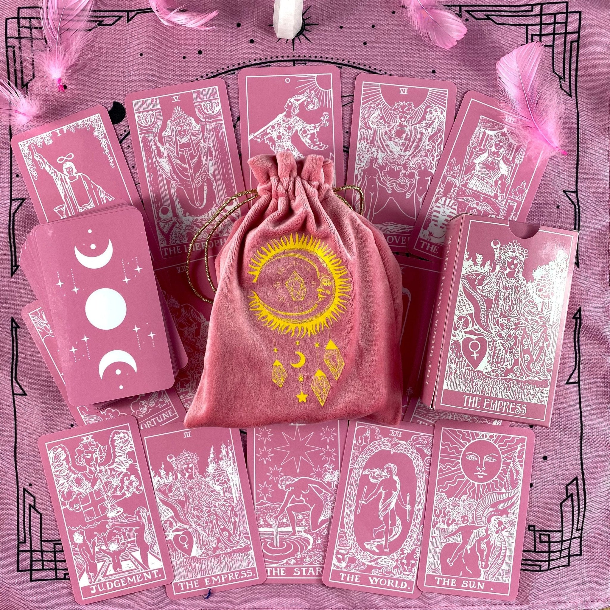 Pink White Tarot Deck featuring 78 cards, a guidebook, and stylish accessories including a velvet bag and wooden box.