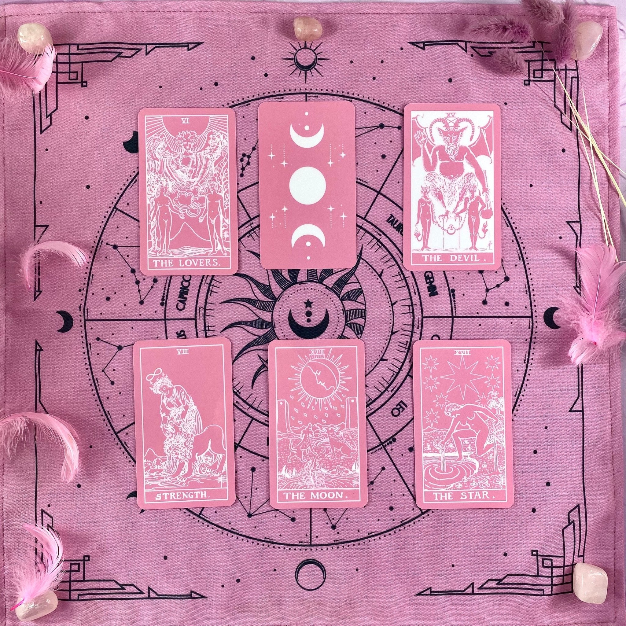 Pink White Tarot Deck featuring 78 cards, a guidebook, and stylish accessories including a velvet bag and wooden box.