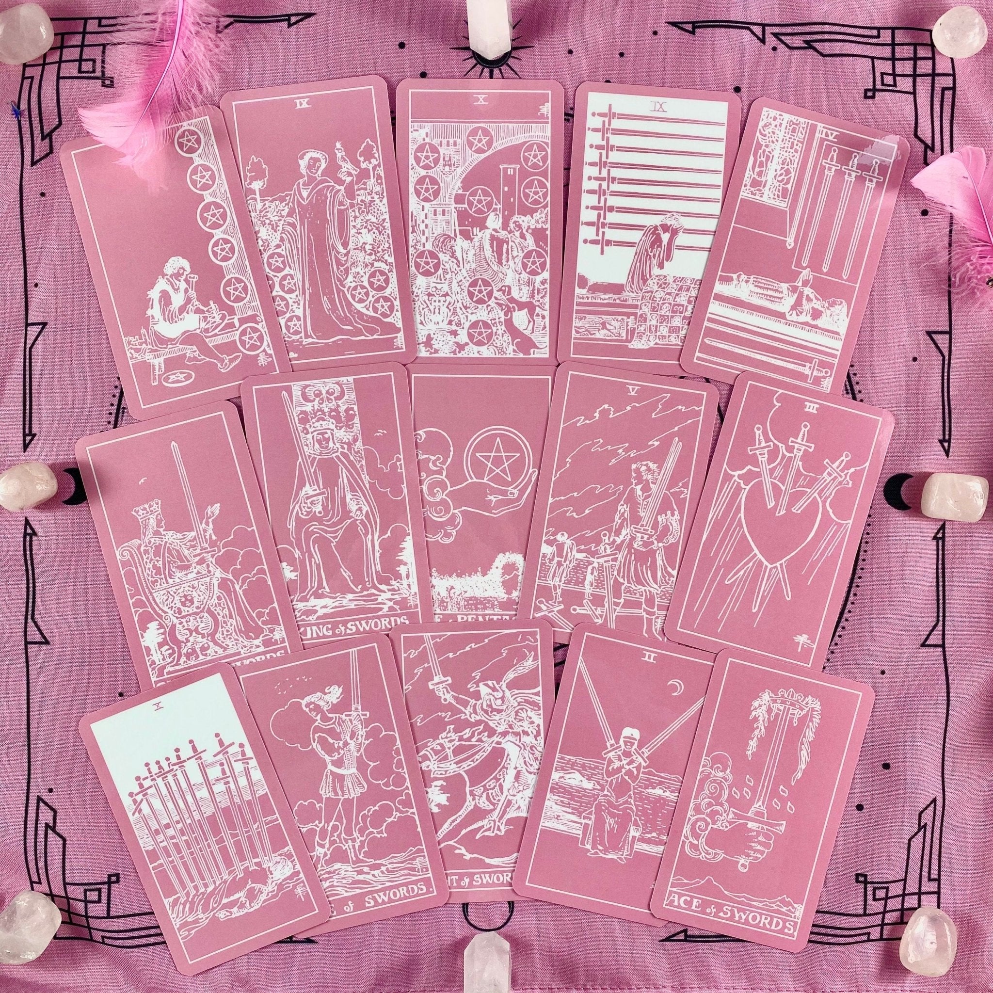 Pink White Tarot Deck featuring 78 cards, a guidebook, and stylish accessories including a velvet bag and wooden box.