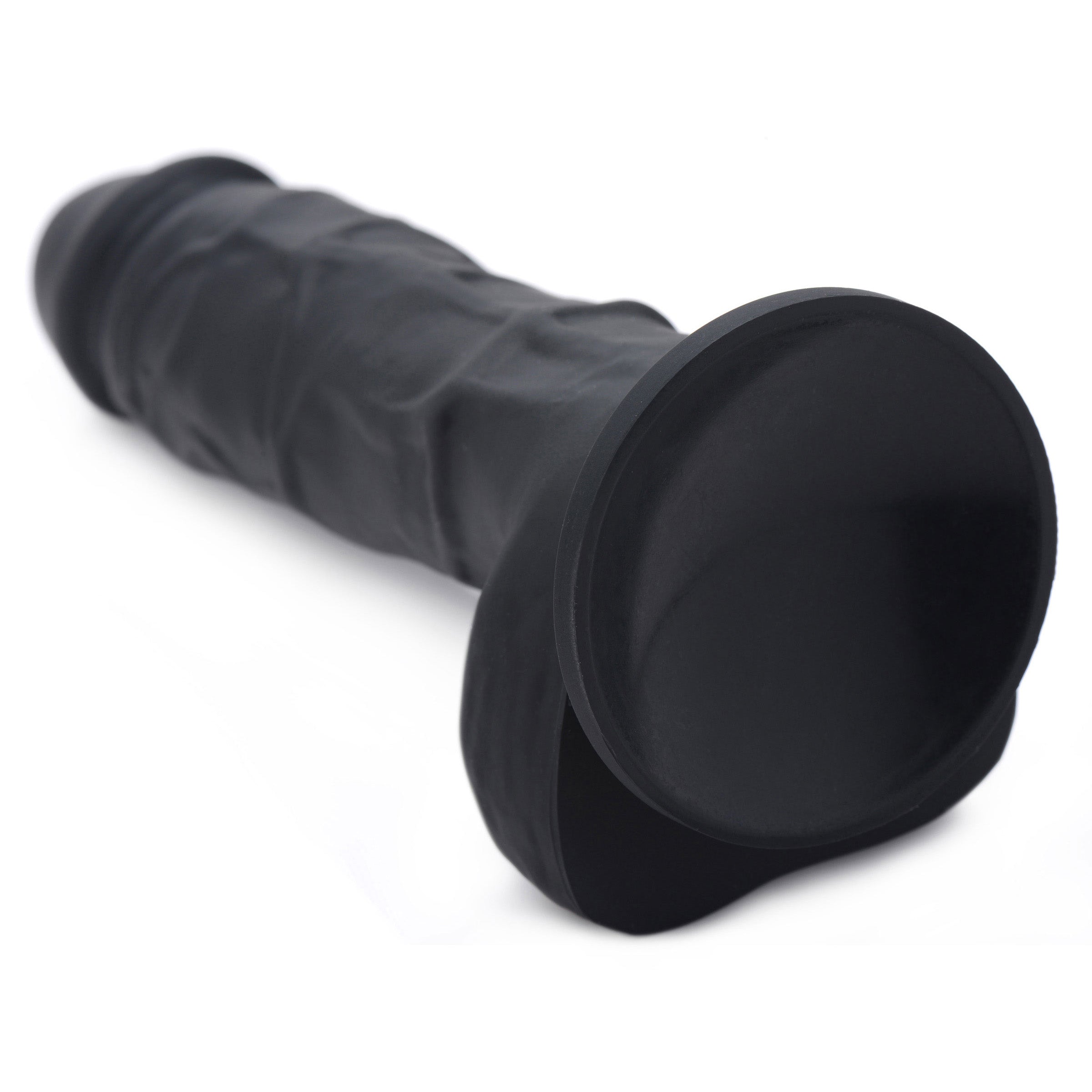 Power Pecker 7 Inch Silicone Dildo in black, featuring realistic veins, defined head, and balls, designed for strap-on compatibility.