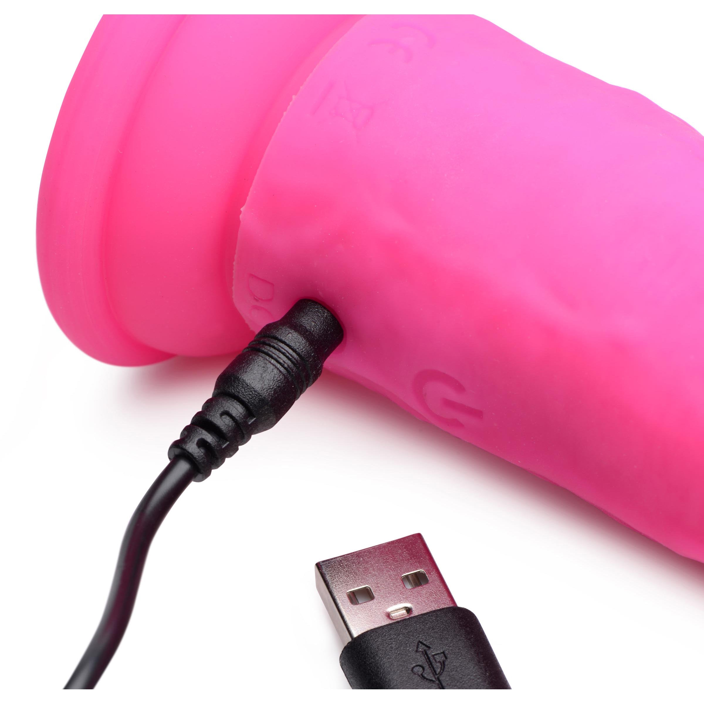 Power Player 28X Vibrating Silicone Dildo in pink with remote control, showcasing its realistic design and suction cup base.