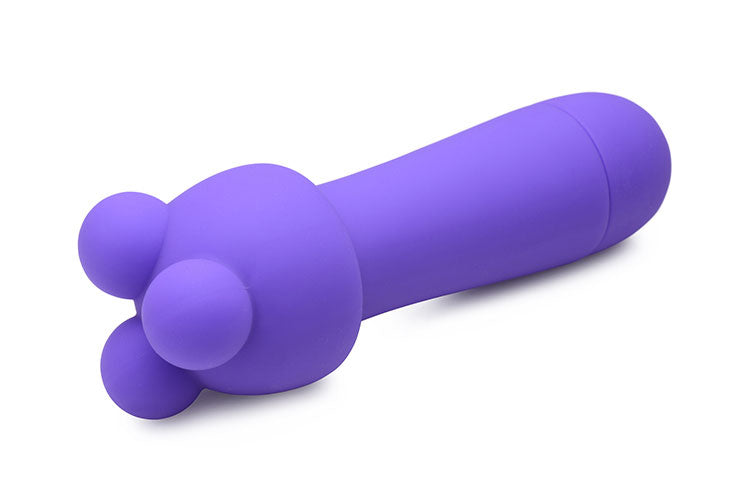 Rocket 10X Silicone Rechargeable Mini Wand with two attachments, showcasing its sleek design and vibrant violet color.