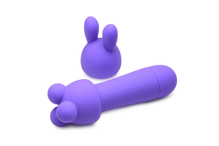 Rocket 10X Silicone Rechargeable Mini Wand with two attachments, showcasing its sleek design and vibrant violet color.