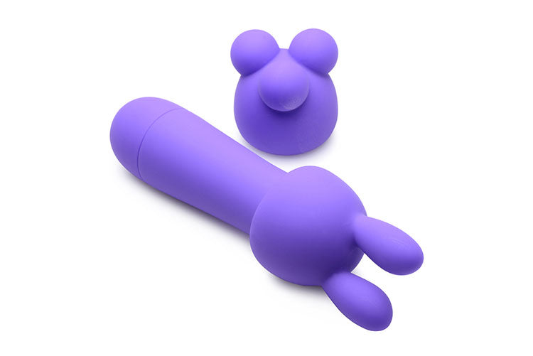 Rocket 10X Silicone Rechargeable Mini Wand with two attachments, showcasing its sleek design and vibrant violet color.