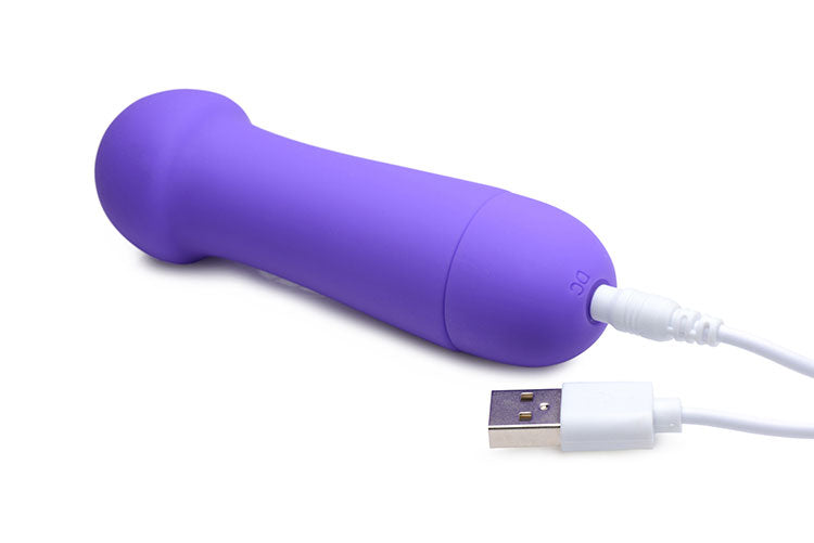 Rocket 10X Silicone Rechargeable Mini Wand with two attachments, showcasing its sleek design and vibrant violet color.