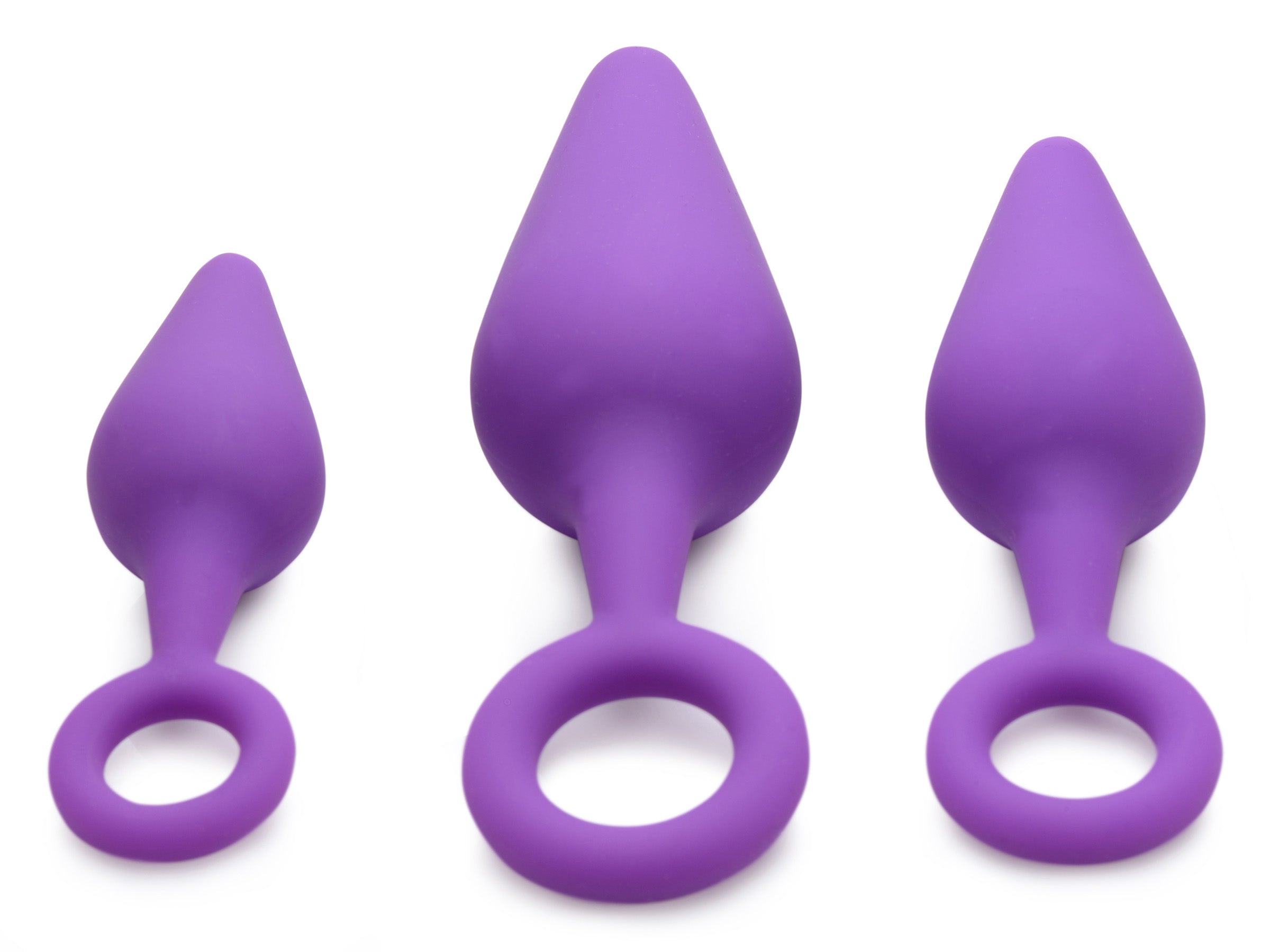 Rump Ringers 3 Piece Silicone Anal Plug Set in purple, featuring graduated sizes and ringed bases for safety.