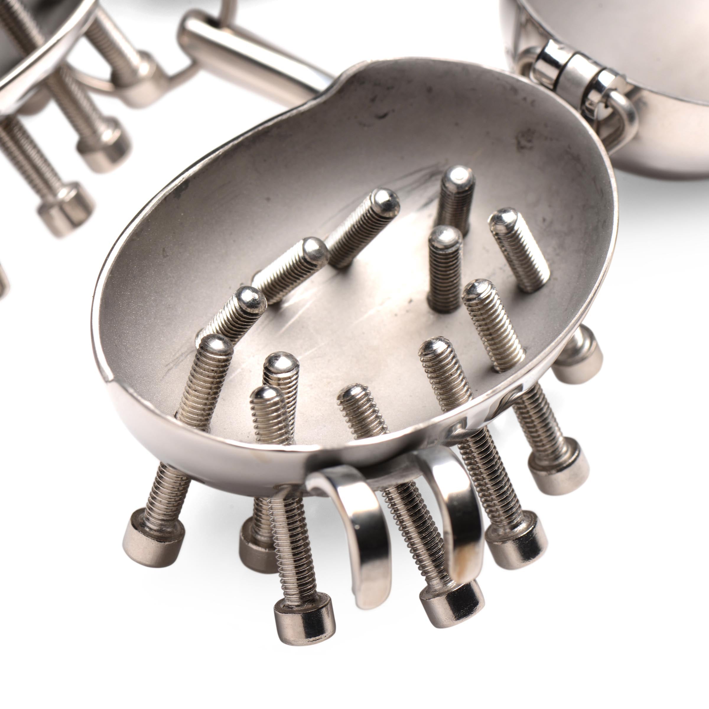 Scrotum Egg Shells with Spikes made of stainless steel, designed for CBT enthusiasts, showcasing their sleek and durable construction.