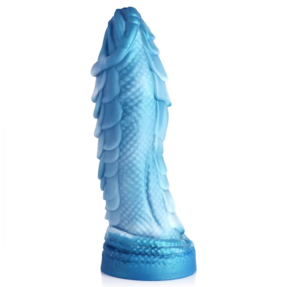 A blue and white silicone dildo shaped like a sea serpent, featuring textured scales and a suction cup base for hands-free use.