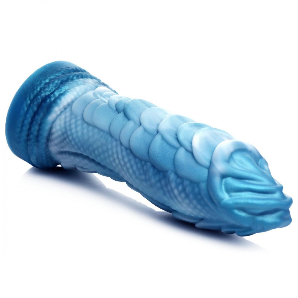 A blue and white silicone dildo shaped like a sea serpent, featuring textured scales and a suction cup base for hands-free use.