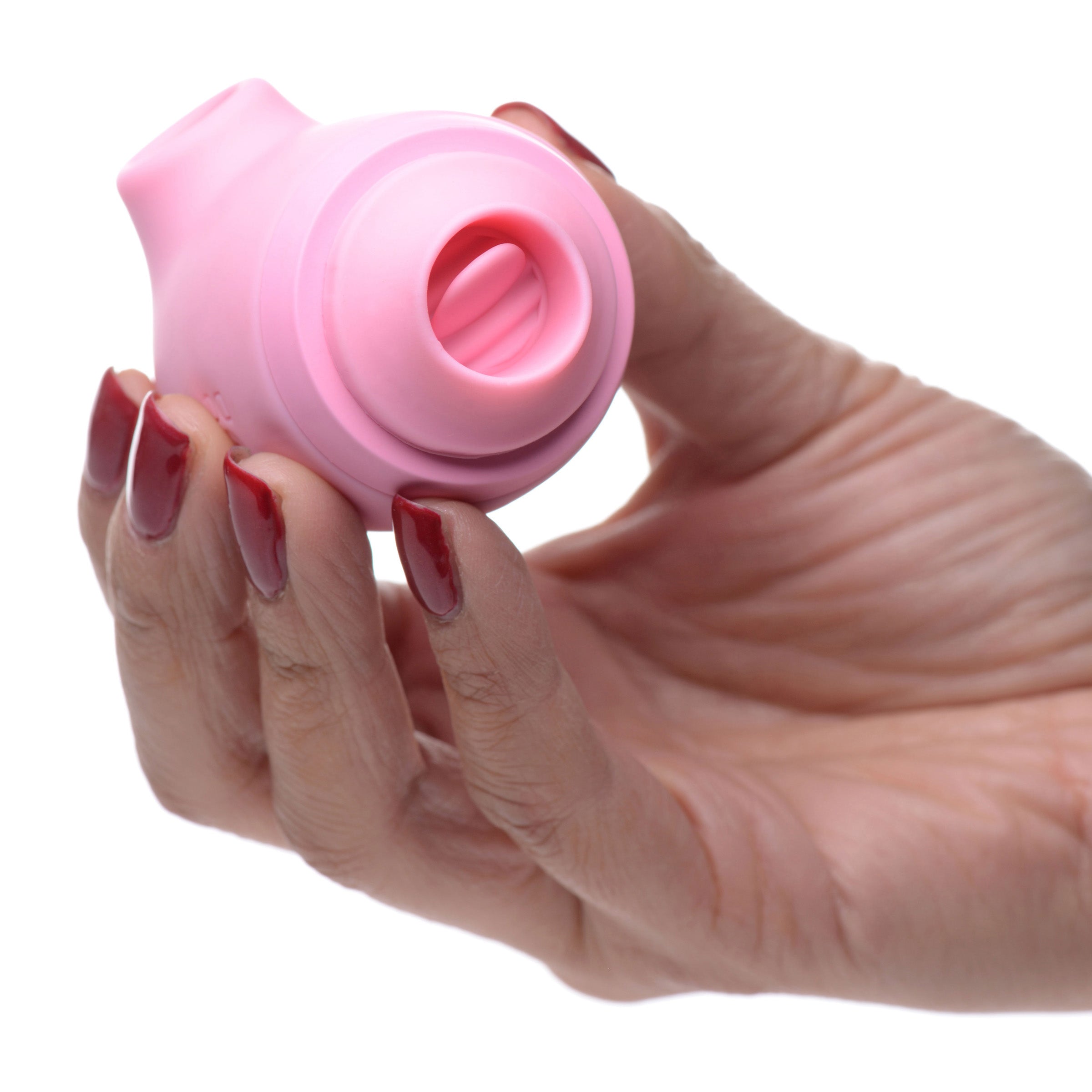 Shegasm Kitty Licker 5X 3-in-1 Clit Stimulator in pink, showcasing its sleek design and multiple stimulation features.