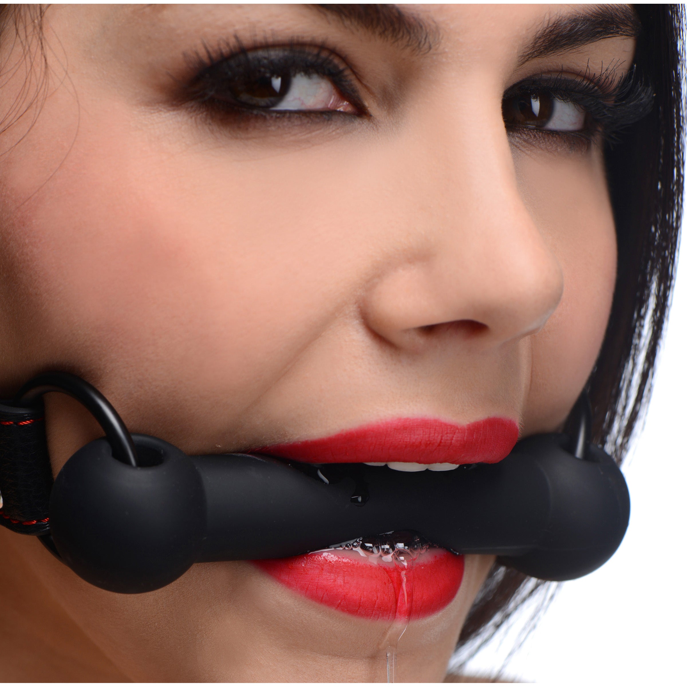 Silicone Bit Gag with adjustable strap and bold red stitching, designed for comfortable bondage play.