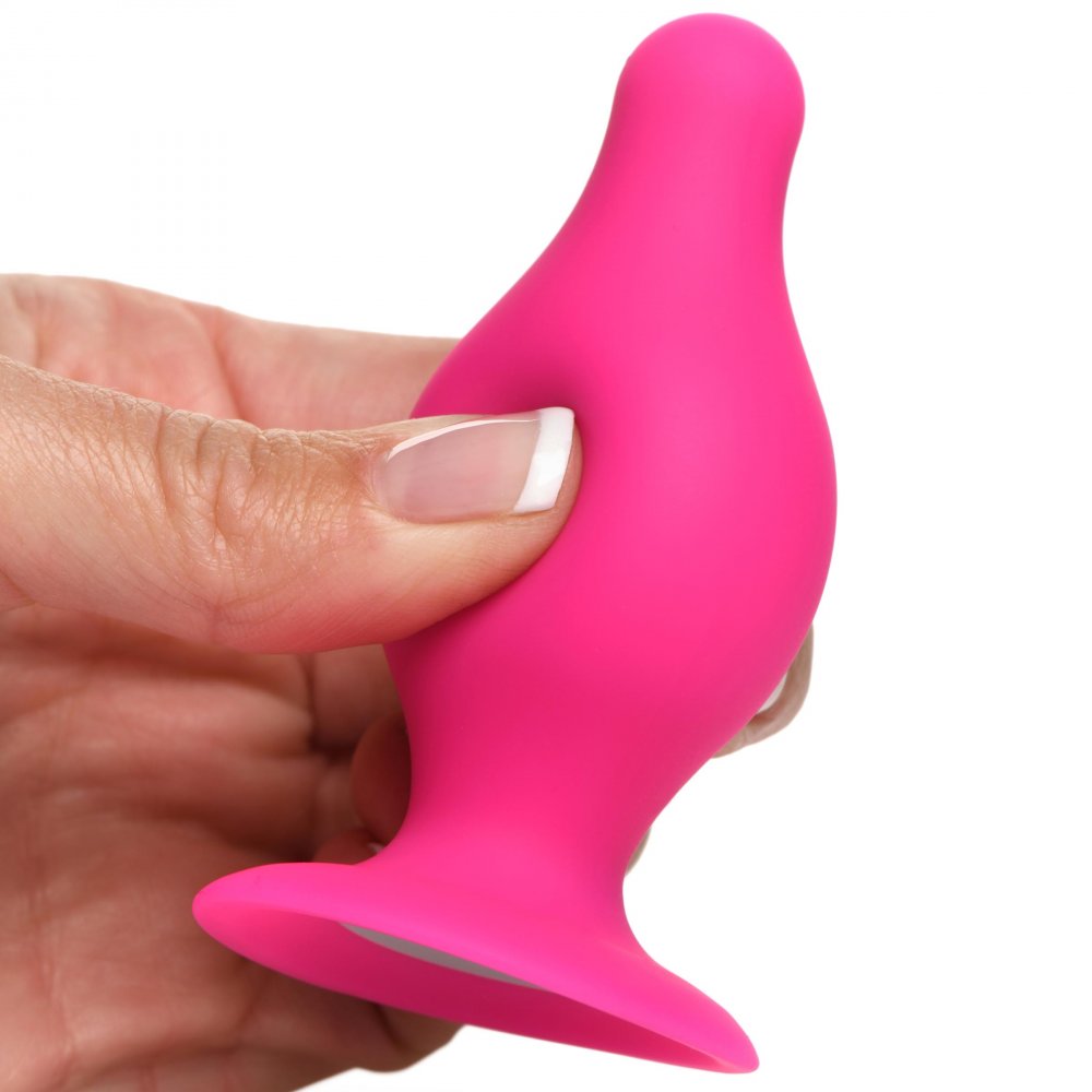 Squeezable Tapered Small Anal Plug in Pink, featuring a tapered tip and flexible design for comfortable anal play.