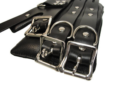 Strict Leather Four Buckle Suspension Cuffs featuring padded wrist wraps and adjustable straps for secure bondage.