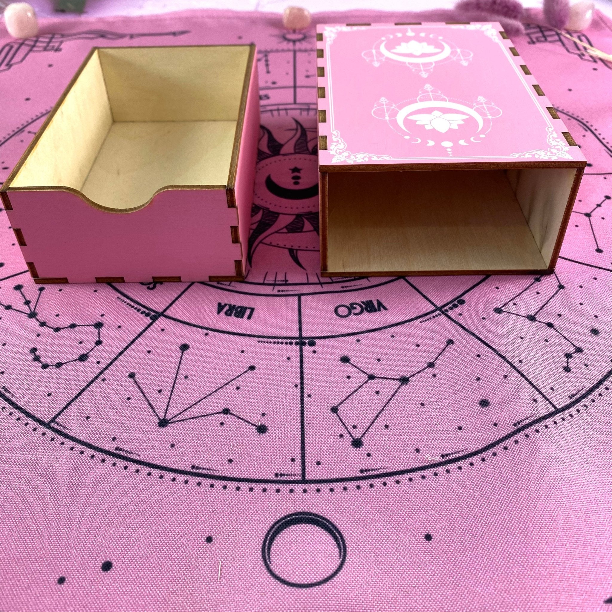 A beautifully crafted oak wooden box featuring a pink lotus design, ideal for storing tarot cards.