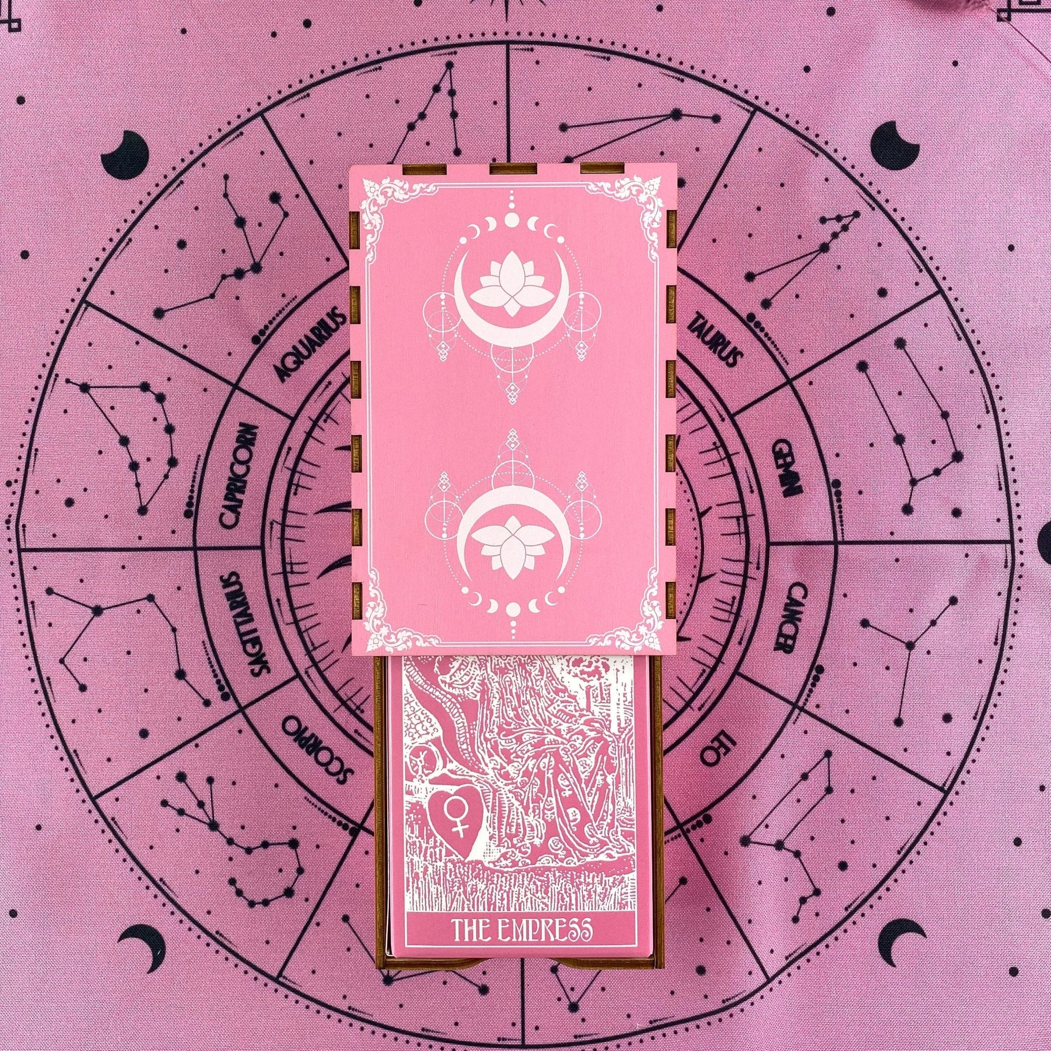 A beautifully crafted oak wooden box featuring a pink lotus design, ideal for storing tarot cards.