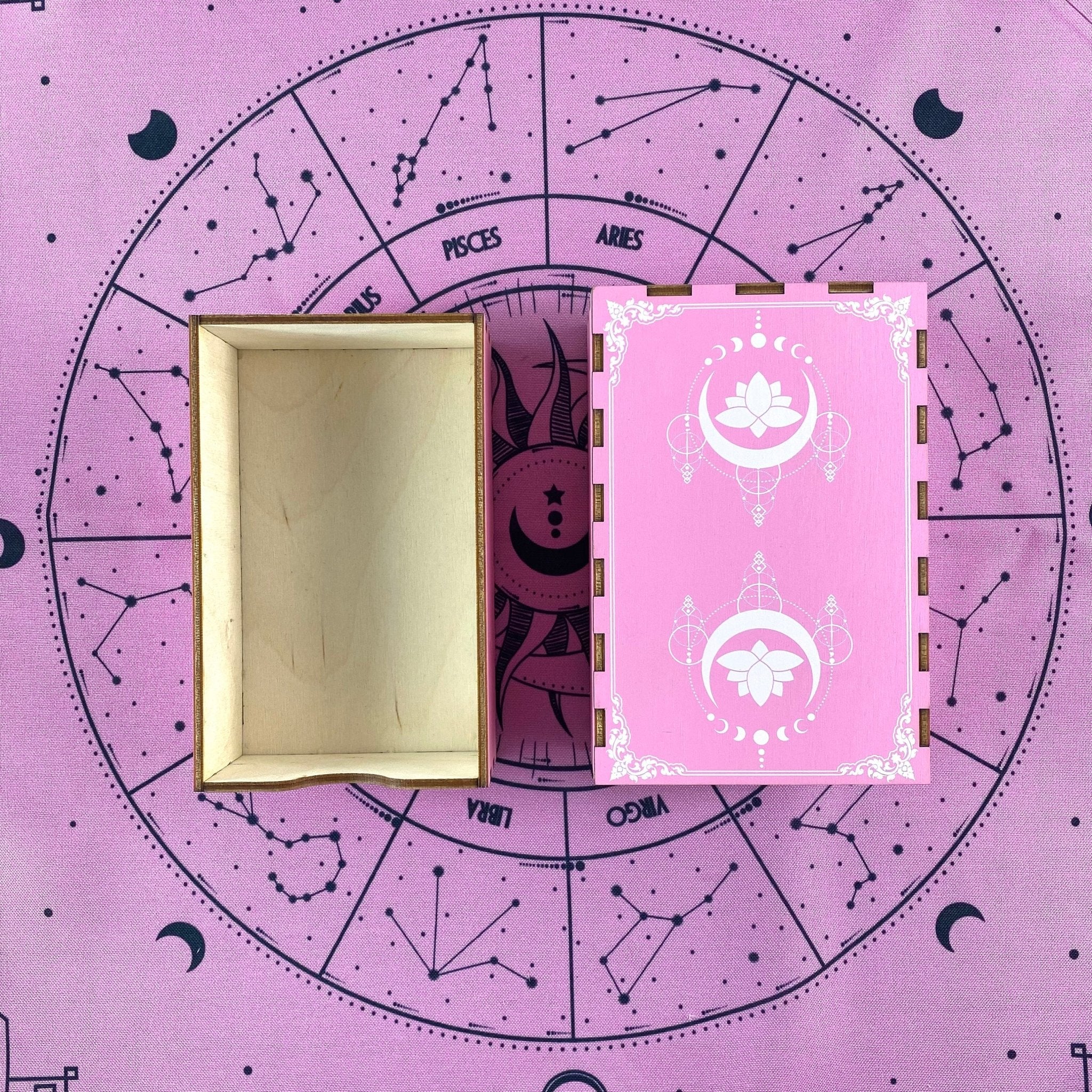 A beautifully crafted oak wooden box featuring a pink lotus design, ideal for storing tarot cards.