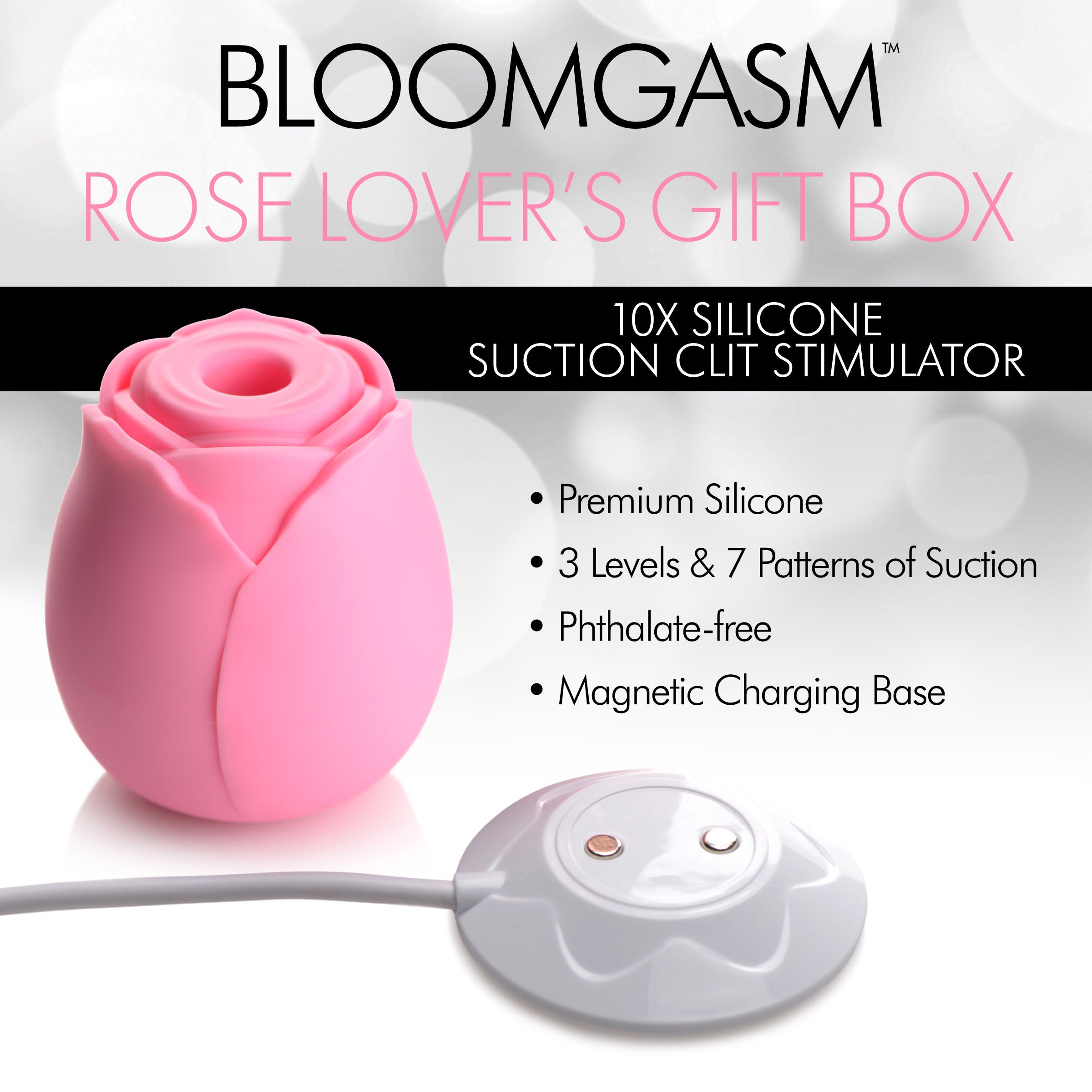 The Rose Lover's Gift Box - Pink featuring a clit stimulator surrounded by decorative roses in a heart-shaped box.