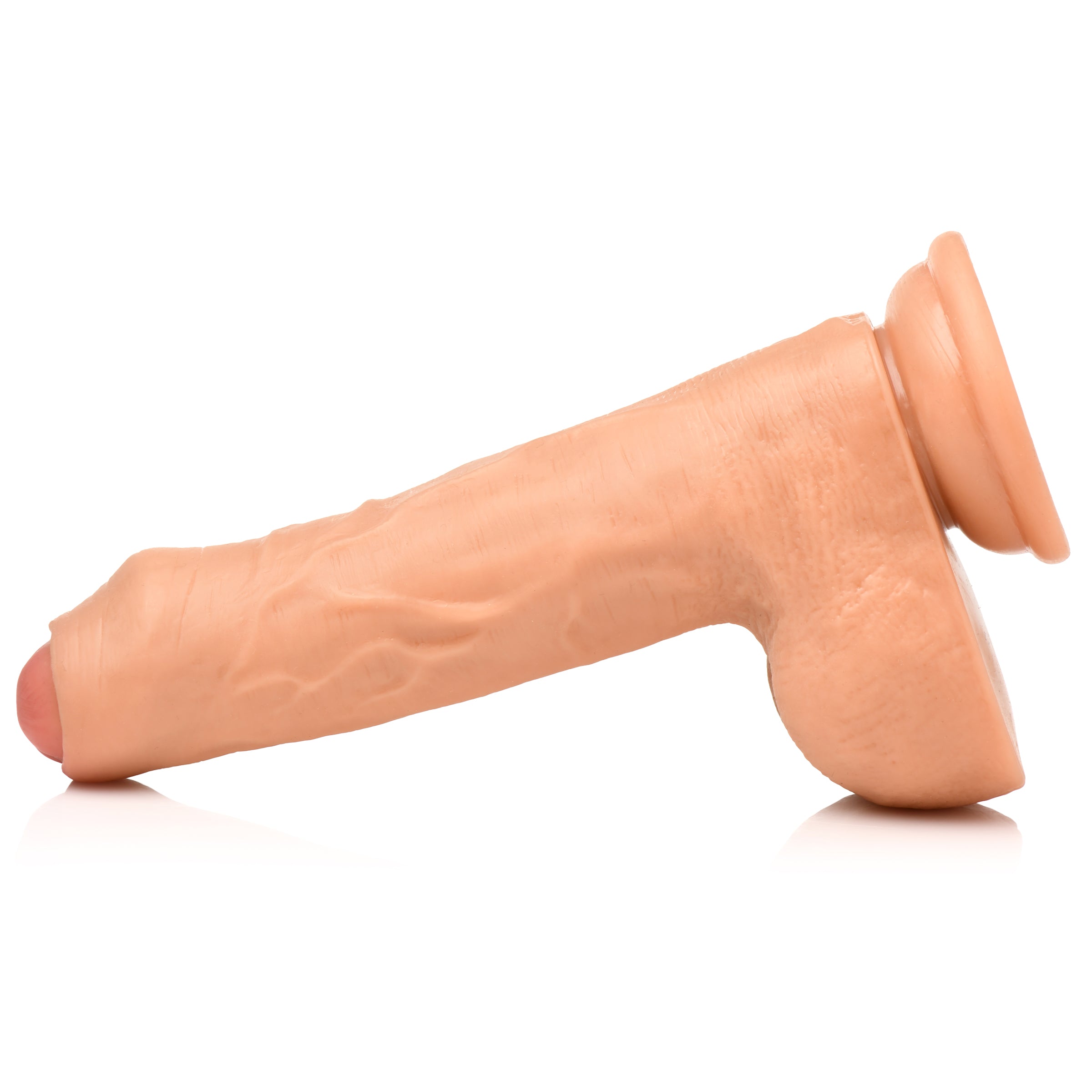 Thinz 7" Uncut Dildo with Balls, featuring realistic details and a strong suction cup base for hands-free pleasure.