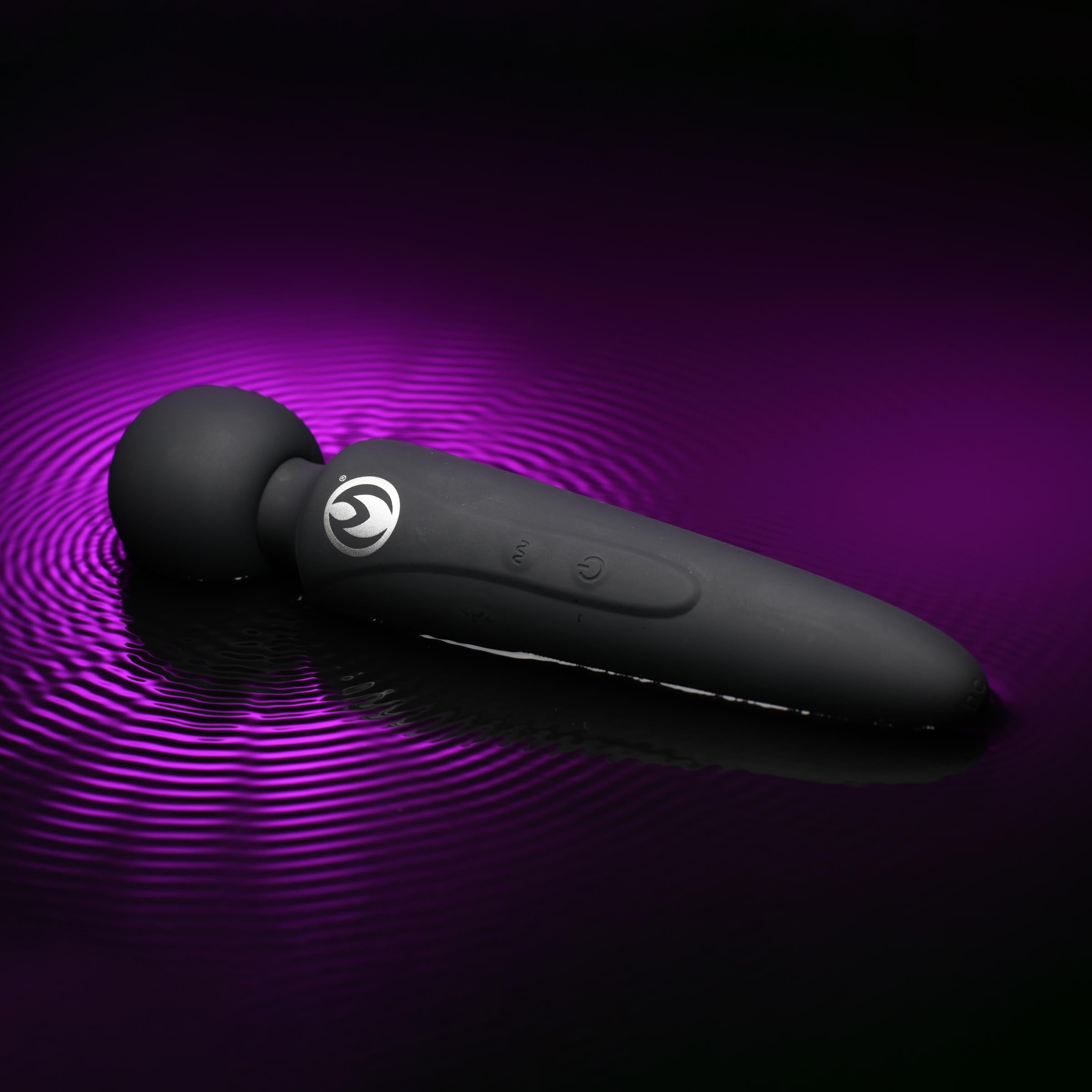 Thunderstick Premium Ultra Powerful Silicone Rechargeable Wand in sleek black silicone with ergonomic handle and round head.