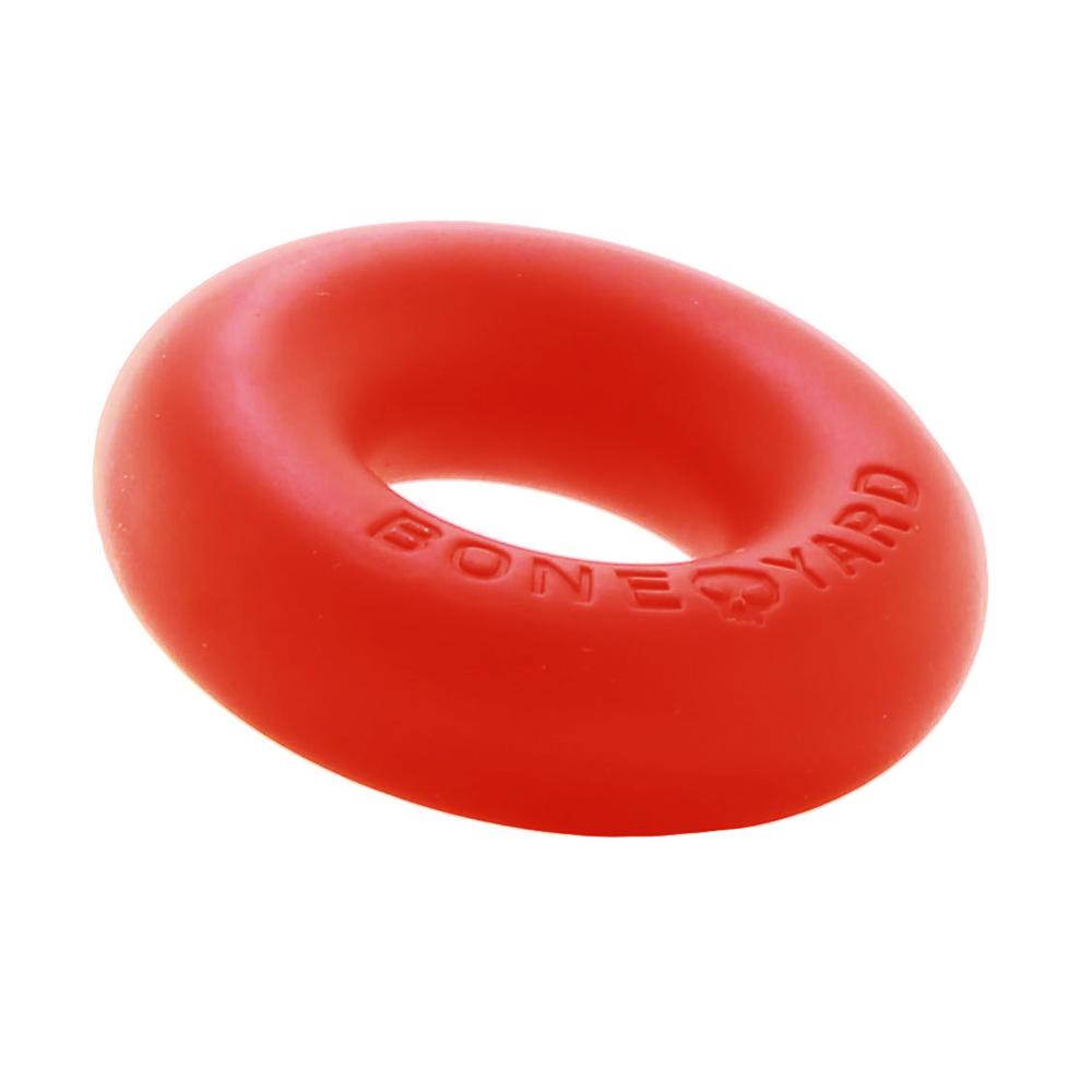 Ultimate Silicone Cock Ring in Red, showcasing its soft touch silicone finish and donut shape, designed for comfort and durability.