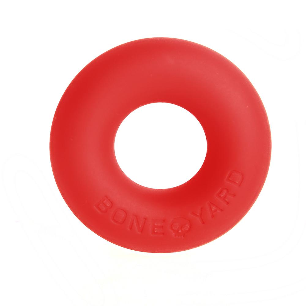 Ultimate Silicone Cock Ring in Red, showcasing its soft touch silicone finish and donut shape, designed for comfort and durability.