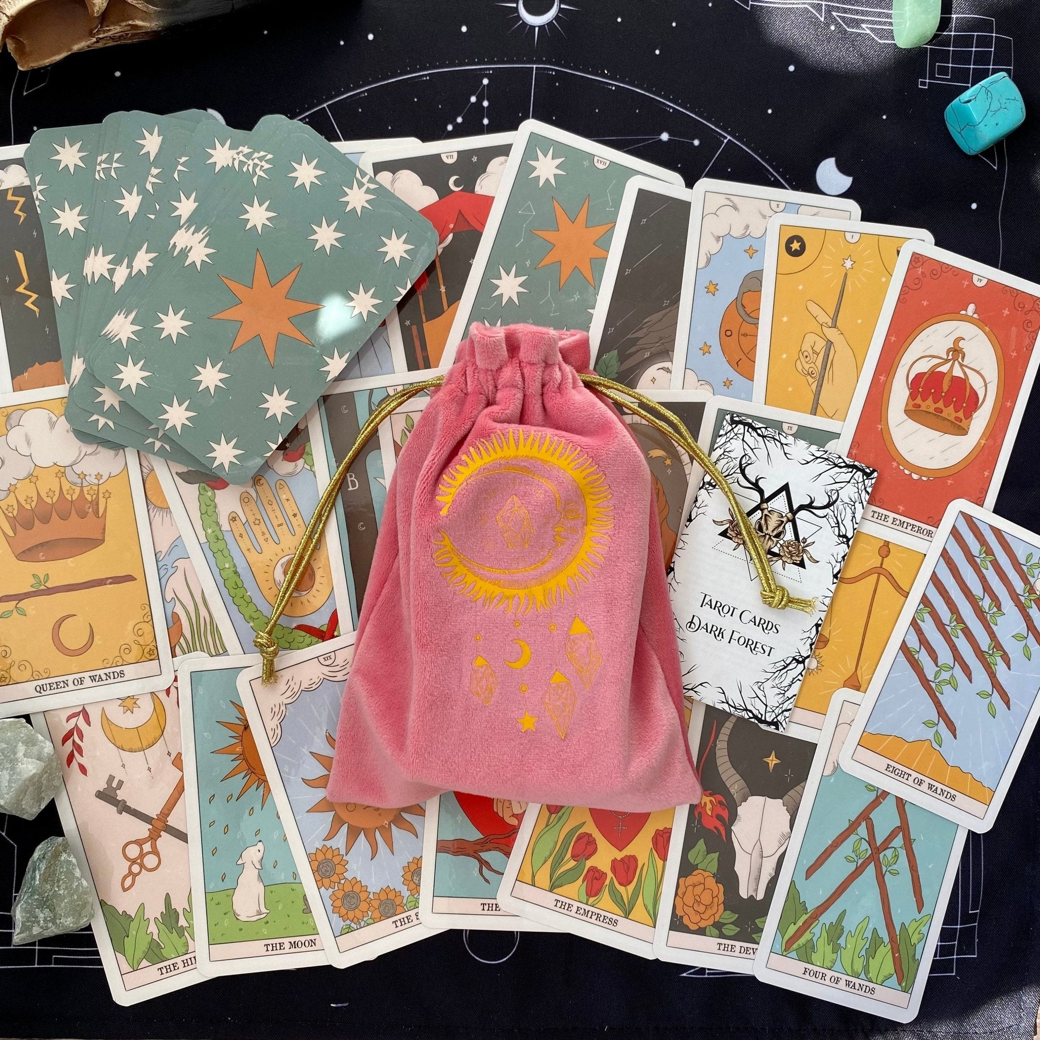 A soft pink velvet bag designed for tarot cards, featuring a durable construction and elegant appearance, perfect for tarot enthusiasts.