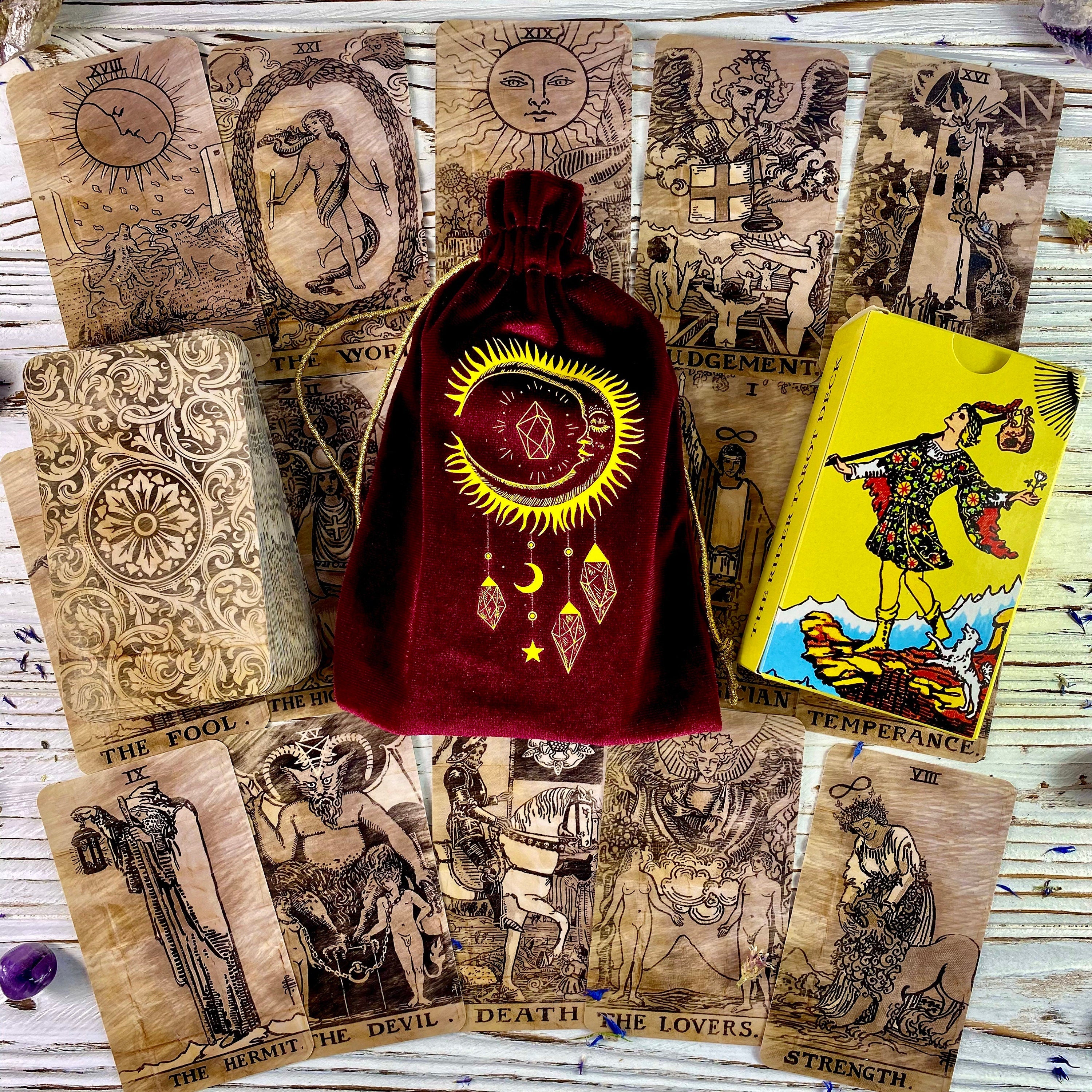 Luxurious red and gold velvet tarot bag designed for storing tarot cards, featuring a soft texture and elegant appearance.