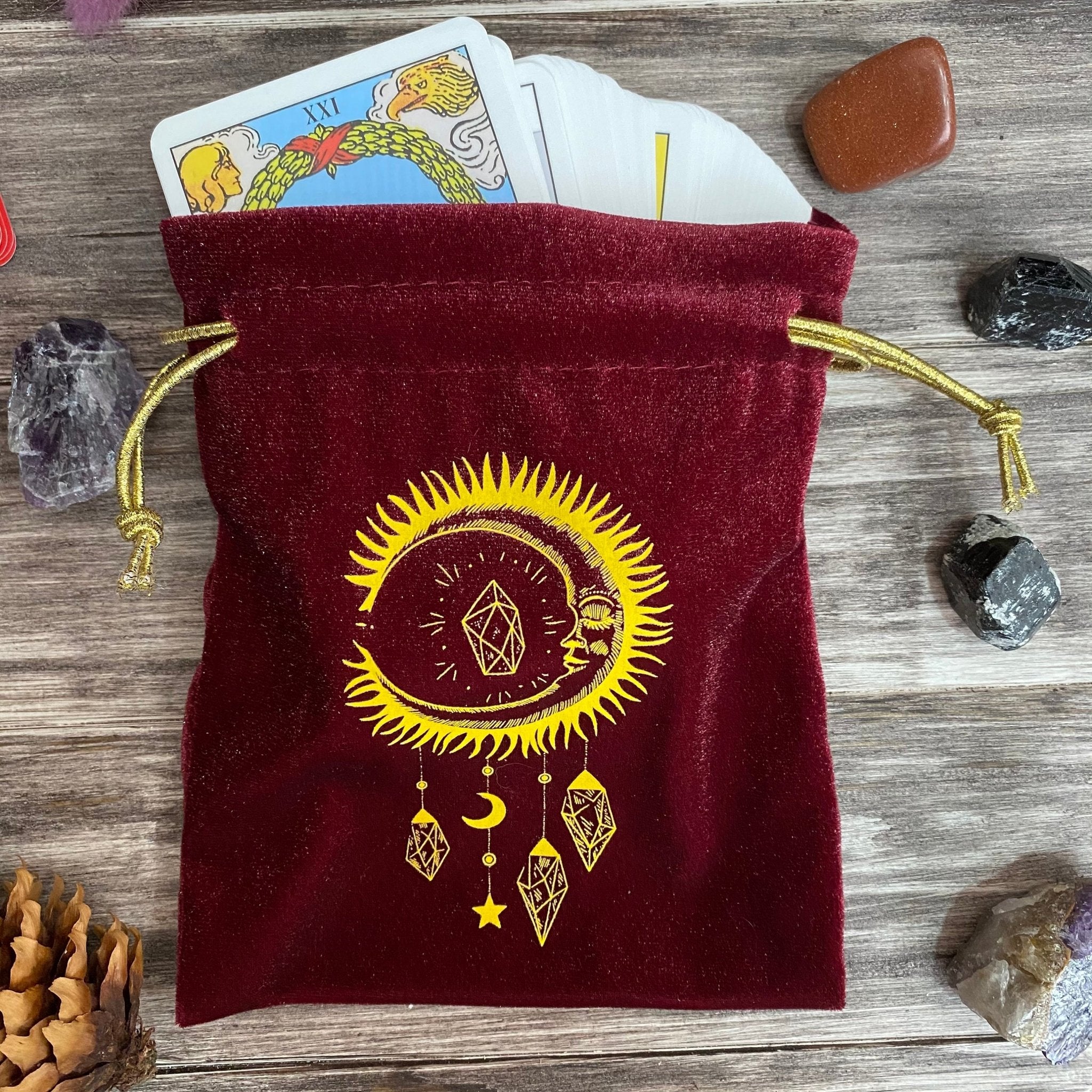 Luxurious red and gold velvet tarot bag designed for storing tarot cards, featuring a soft texture and elegant appearance.