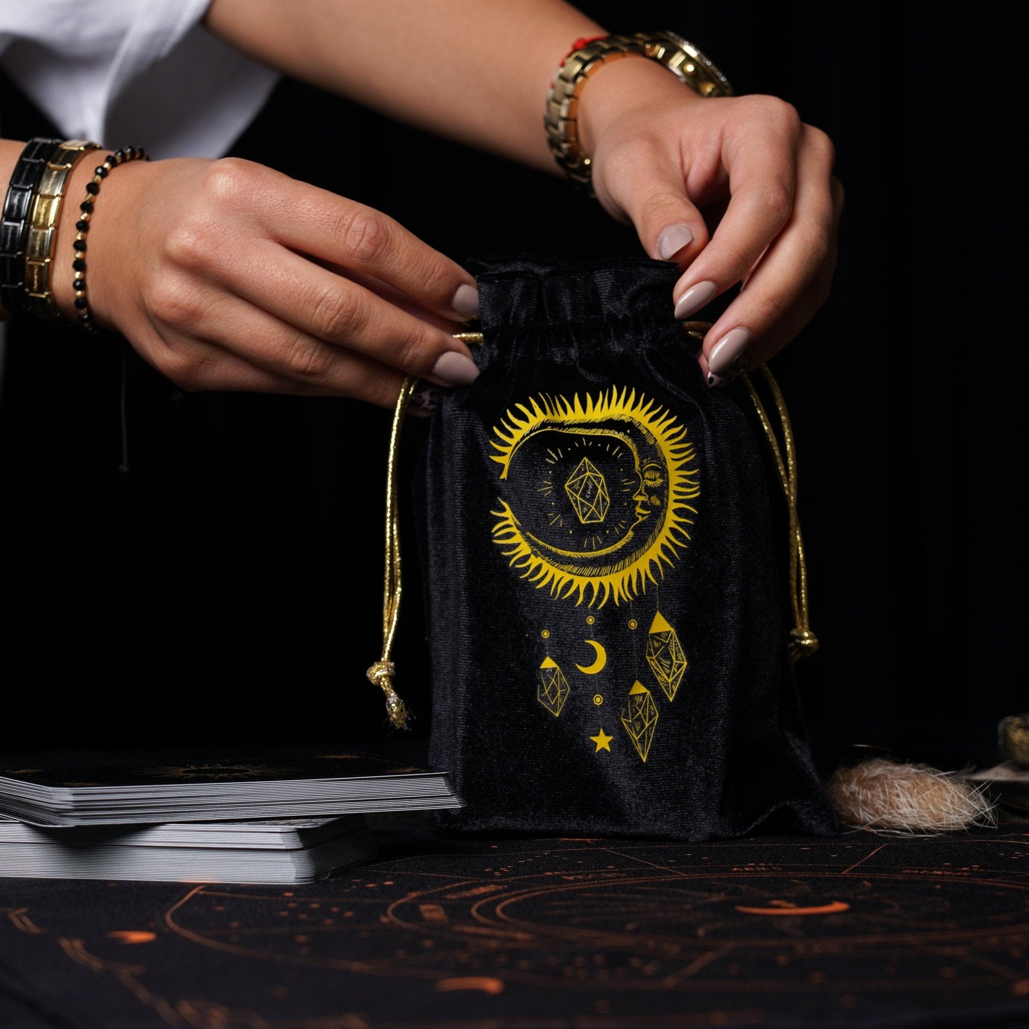 Luxurious black and gold velvet tarot cards bag, designed for protection and style, featuring soft fabric and elegant accents.