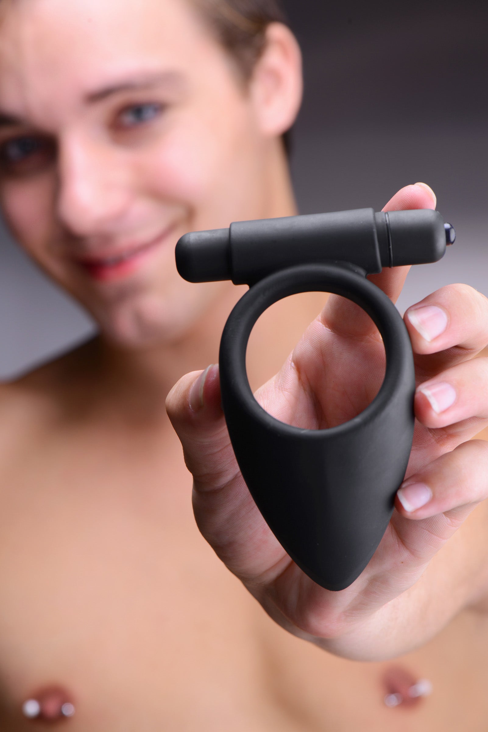 Vibro Silicone Cock Ring with Taint Teaser, featuring a removable vibrating bullet and a unique tear drop design for enhanced stimulation.