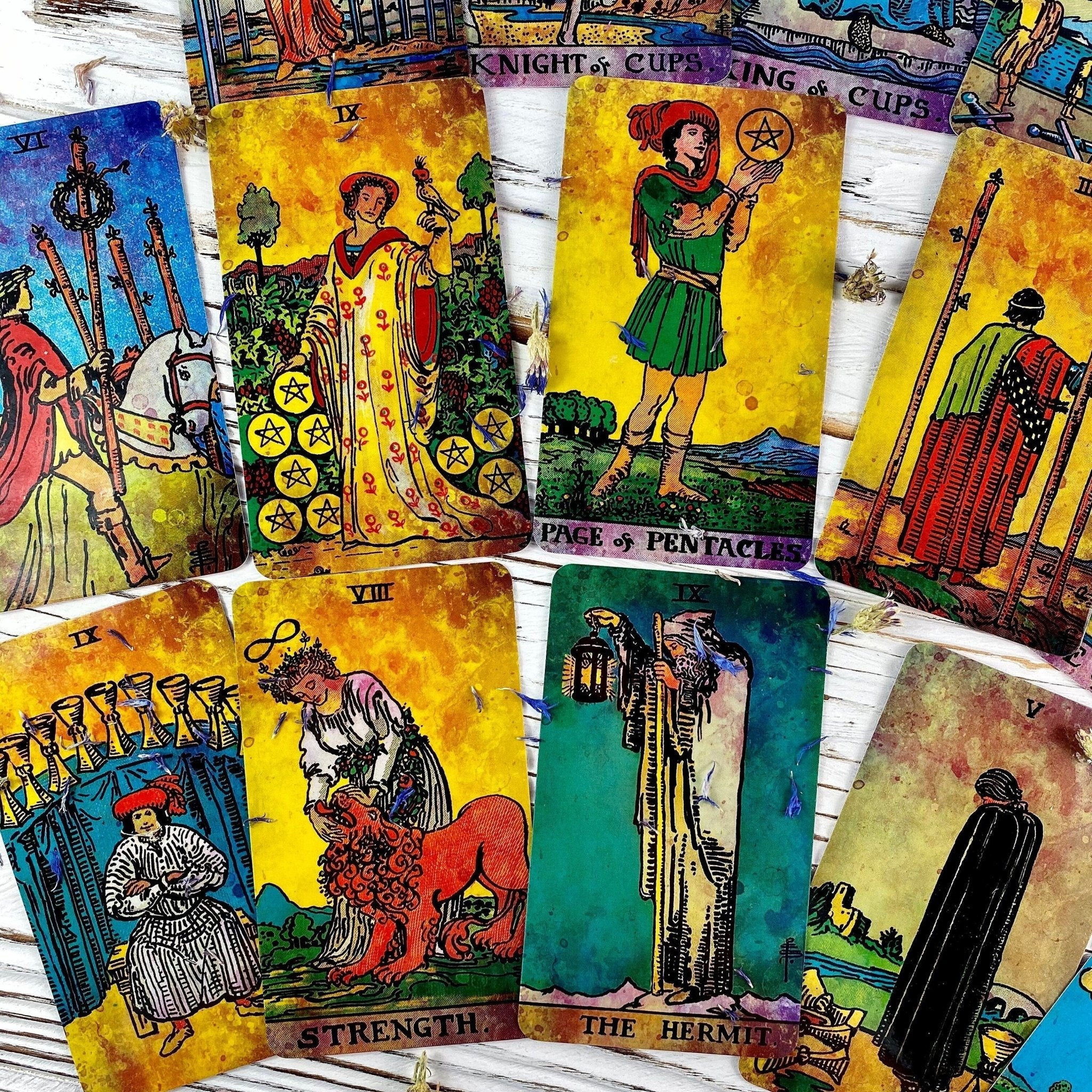 Colorful tarot cards spread out.