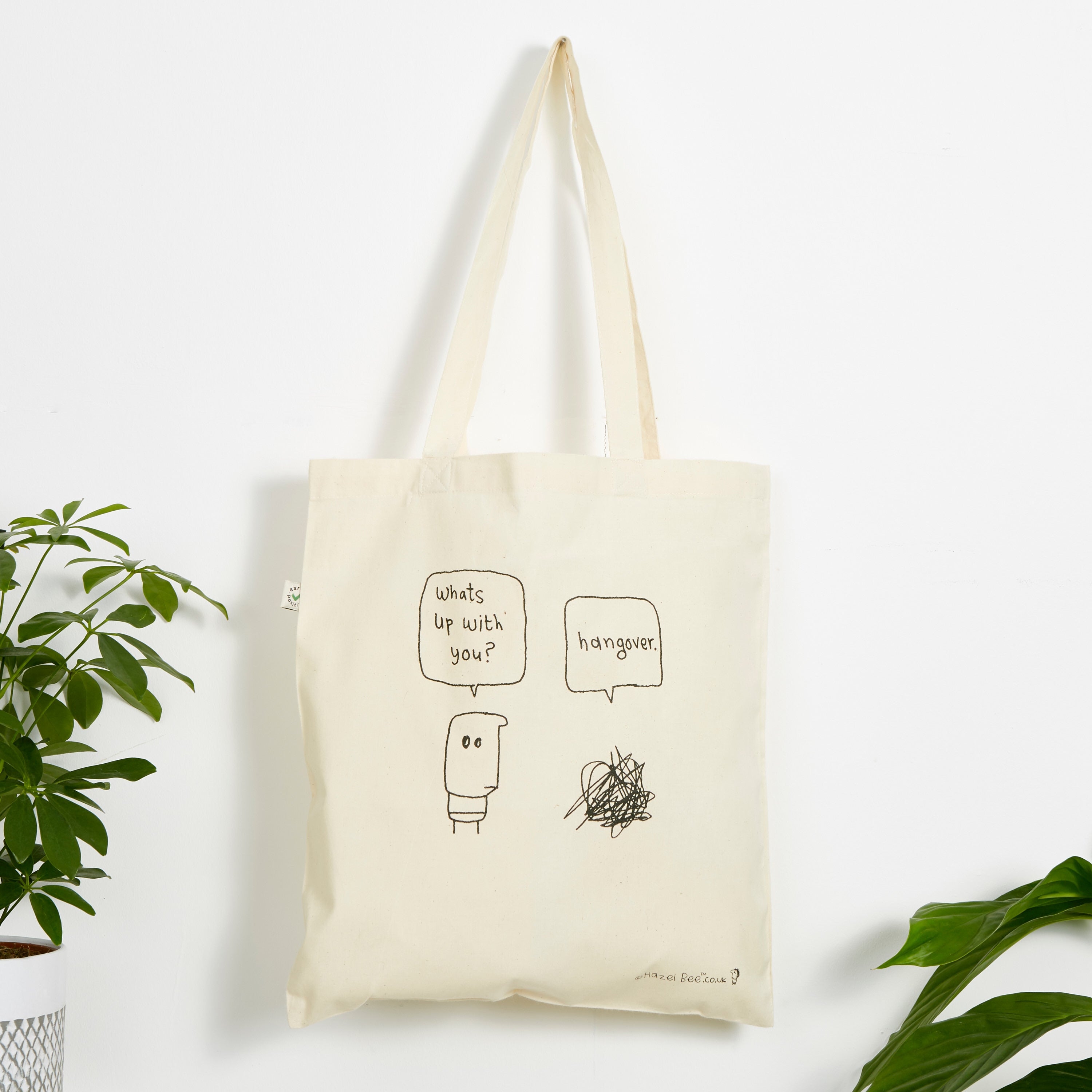 Eco-friendly Hangover Bag made from 100% organic cotton, featuring a stylish hand-printed design in black ink on both sides.