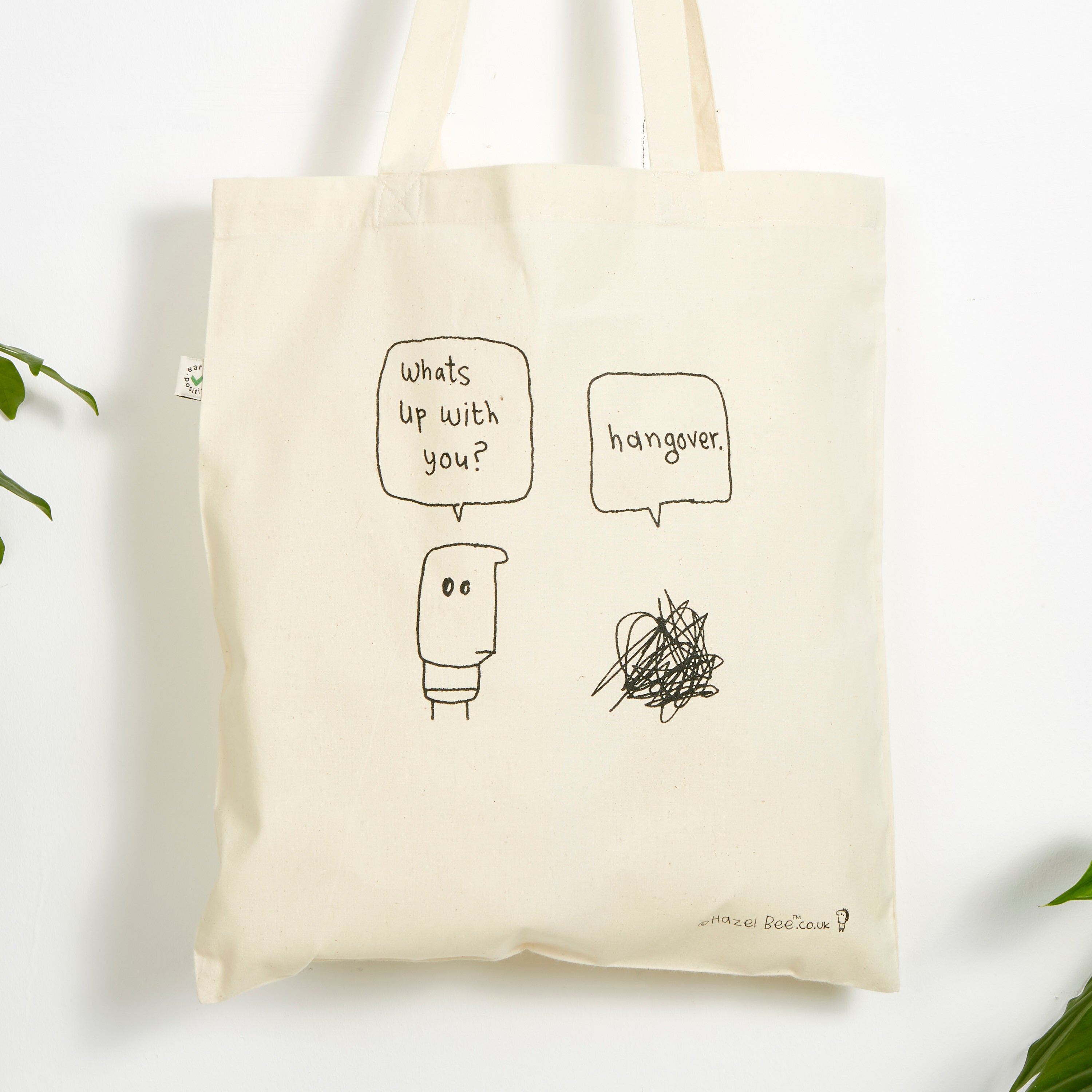 Eco-friendly Hangover Bag made from 100% organic cotton, featuring a stylish hand-printed design in black ink on both sides.