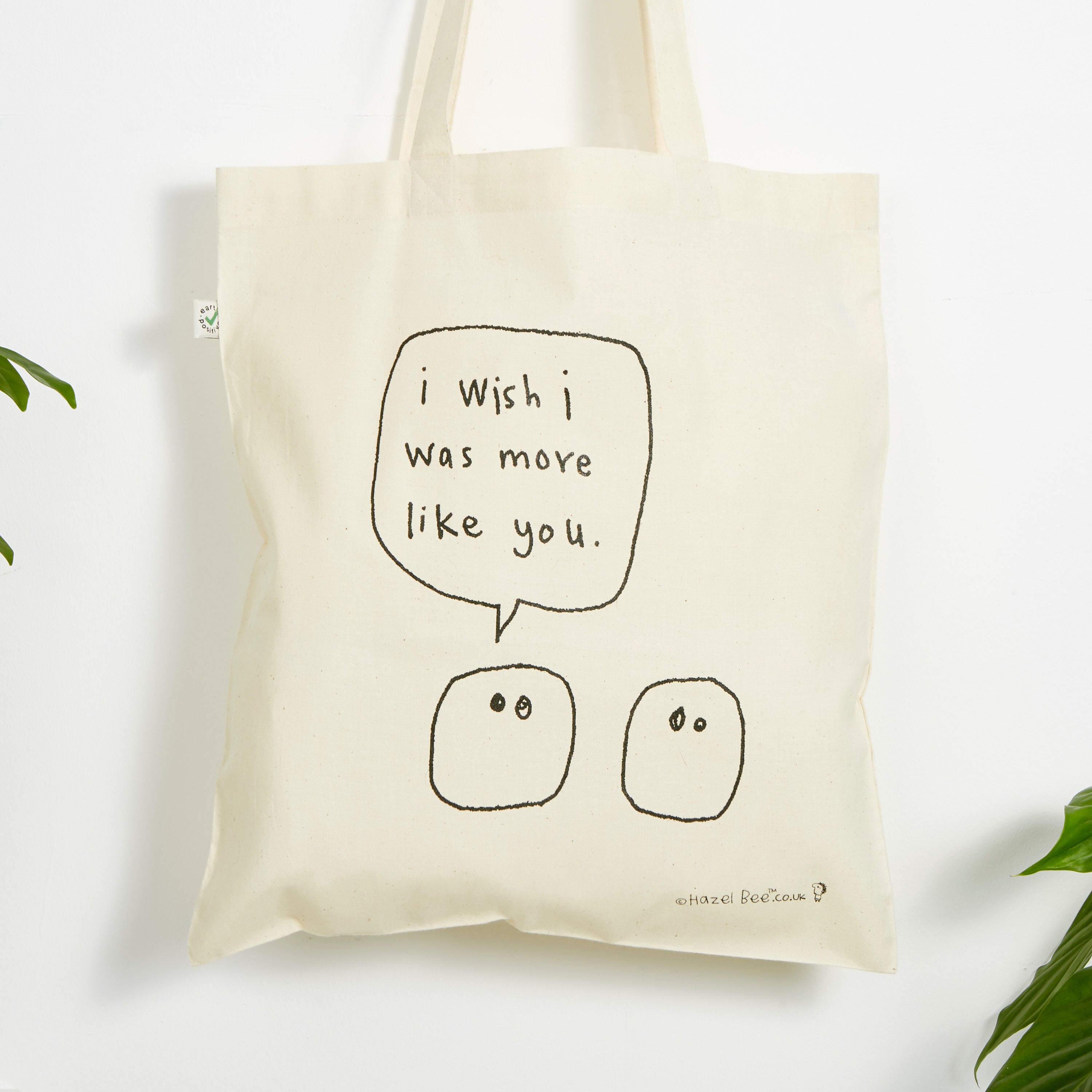 More Like You Blobs Bag made from organic cotton, featuring a hand-printed design in black ink on both sides, perfect for carrying various items.