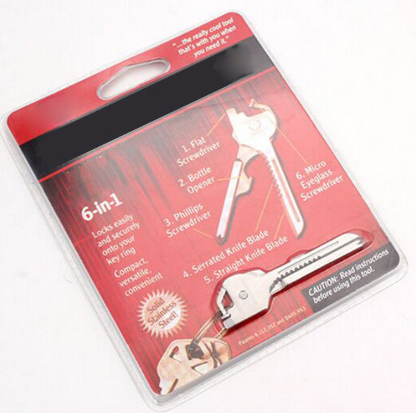 Multipurpose Keychain Key Survive Pocket Opener in stainless steel, showcasing its compact design and multifunctional features.