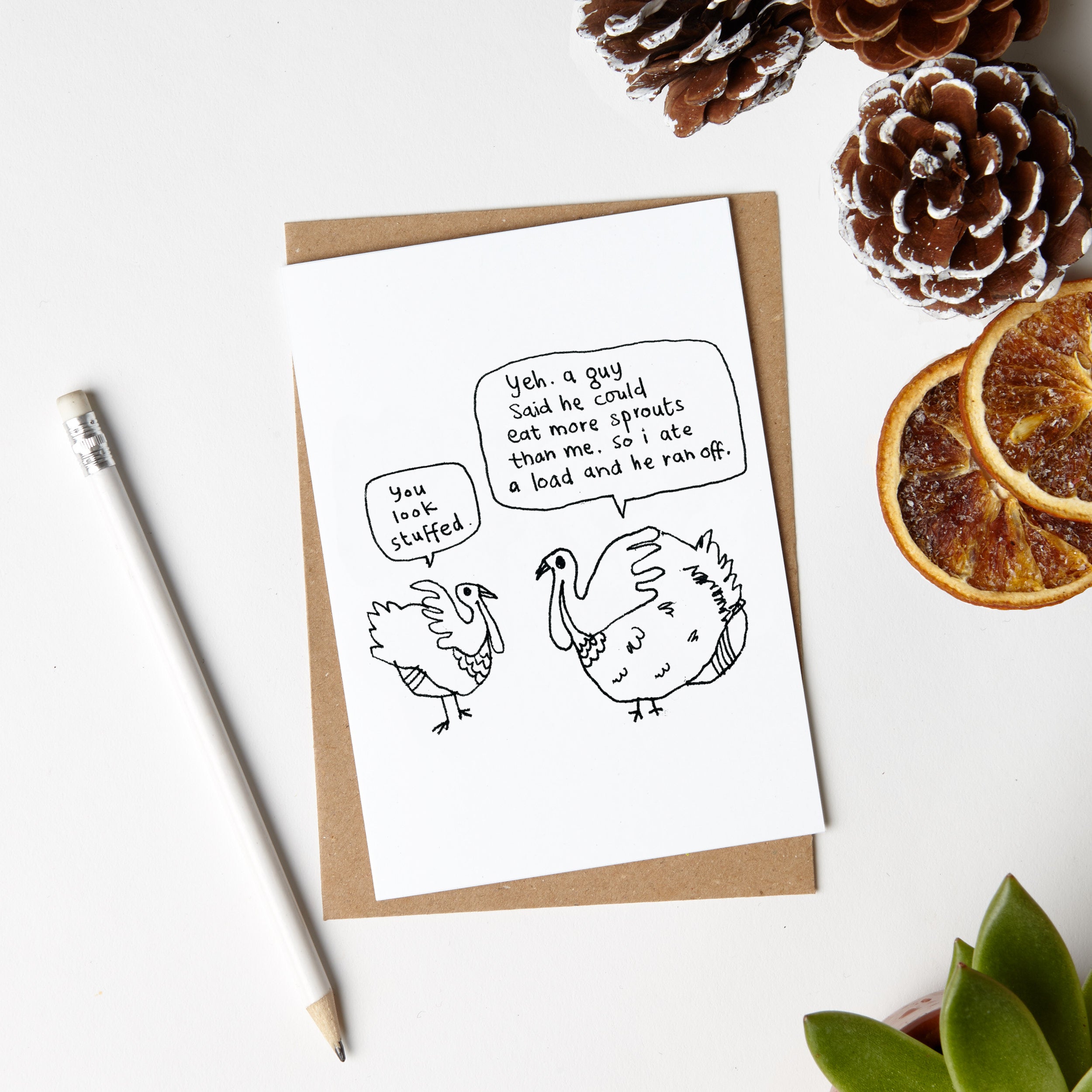 Eco-friendly Sprout Turkeys Card made from recycled materials, featuring vibrant vegetable ink printing and a blank interior for personal messages.