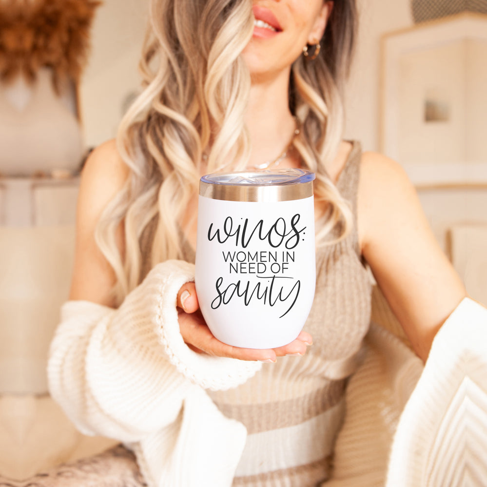 Winos 12oz funny wine tumbler for women, featuring a humorous design, stainless steel construction, and a clear lid with slide closure.