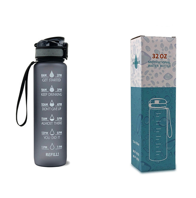 1L Tritan water bottle with time markers and bounce cover, featuring motivational quotes and a secure flip-top lid.