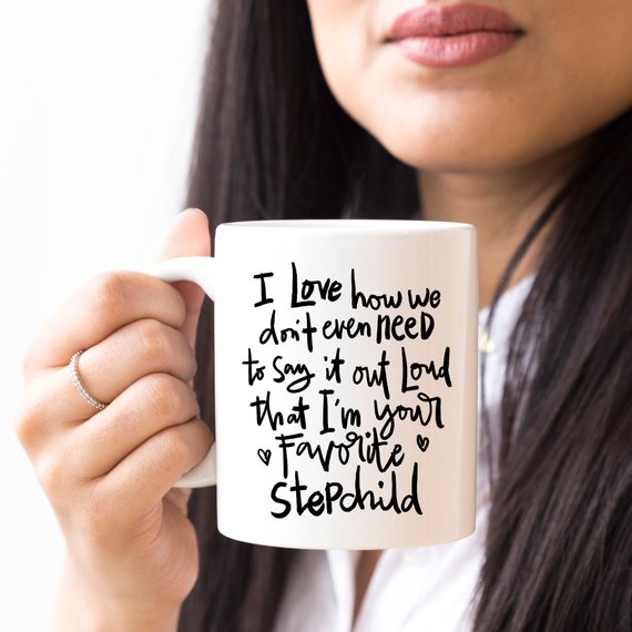 A humorous 11oz ceramic coffee mug with a funny quote for stepchildren, showcasing a vibrant design perfect for gifting.