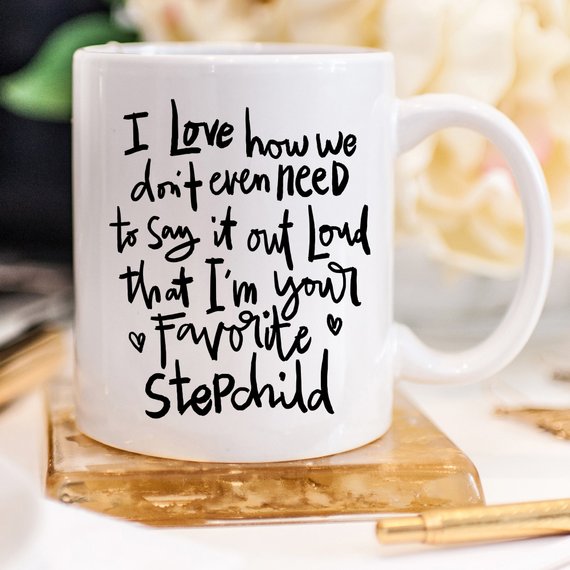 A humorous 11oz ceramic coffee mug with a funny quote for stepchildren, showcasing a vibrant design perfect for gifting.