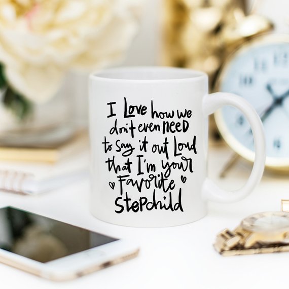 A humorous 11oz ceramic coffee mug with a funny quote for stepchildren, showcasing a vibrant design perfect for gifting.