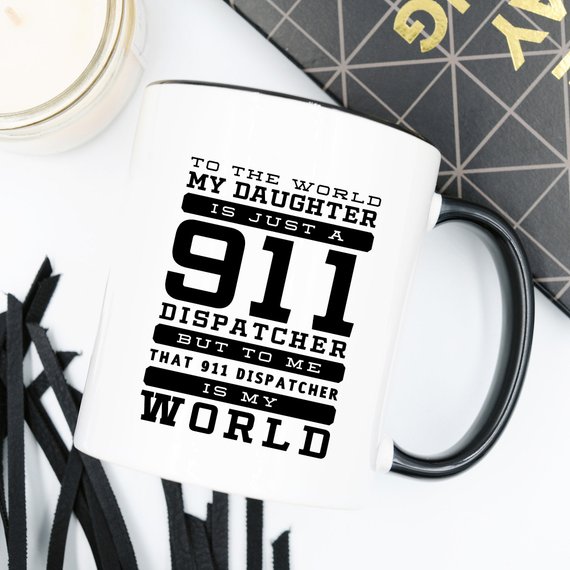 A white ceramic mug featuring a vibrant design celebrating 911 dispatchers, printed on both sides.