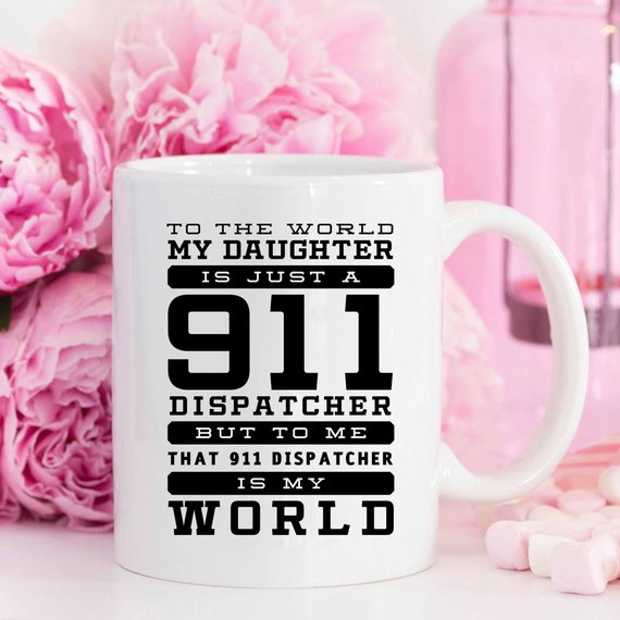 A white ceramic mug featuring a vibrant design celebrating 911 dispatchers, printed on both sides.