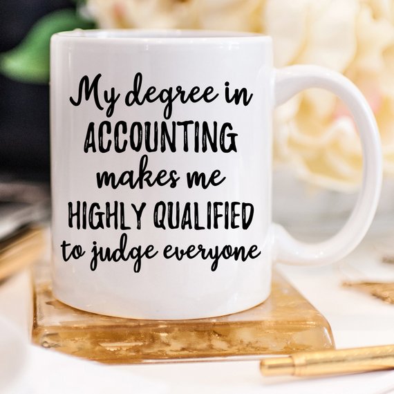 High-quality white ceramic accountant mug with vibrant design printed on both sides, perfect for coffee lovers.