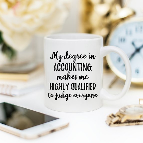 High-quality white ceramic accountant mug with vibrant design printed on both sides, perfect for coffee lovers.