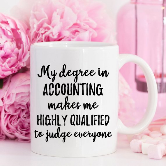 High-quality white ceramic accountant mug with vibrant design printed on both sides, perfect for coffee lovers.