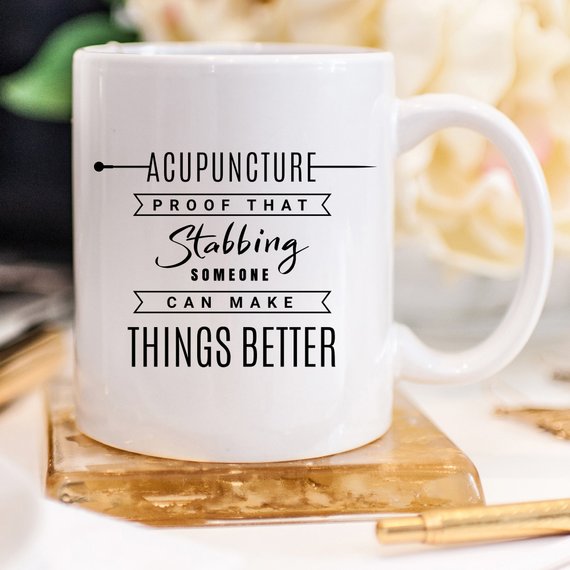 Funny acupuncture coffee mug with humorous text, perfect gift for acupuncturists.