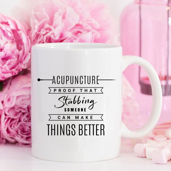 Funny acupuncture coffee mug with humorous text, perfect gift for acupuncturists.