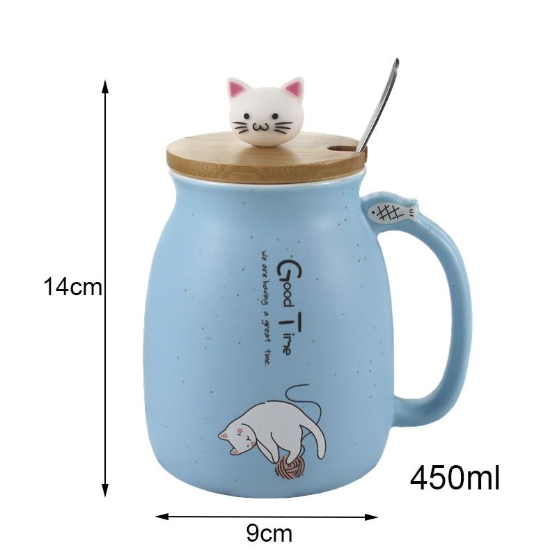 A colorful ceramic coffee mug featuring an adorable cat cartoon design, available in pink, yellow, and blue.